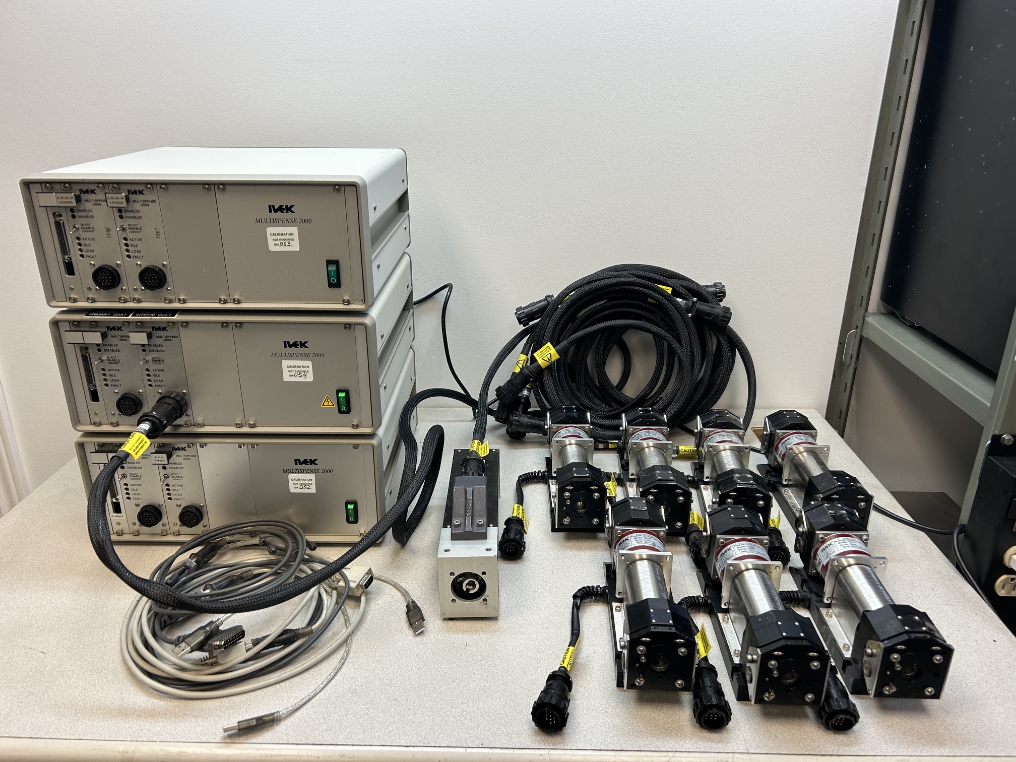 Lot of IVEK Multispense 2000 controllerS & actuators